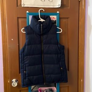 Dark blue puffy vest